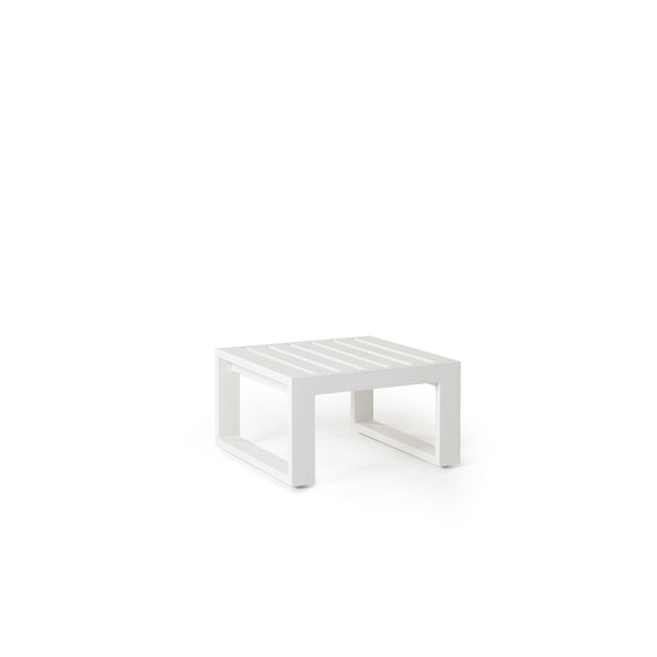 The Belvedere Side Table in White Aluminum by Terra Outdoor Living. Compact slatted side table, with architectural clean lines and sled style legs.